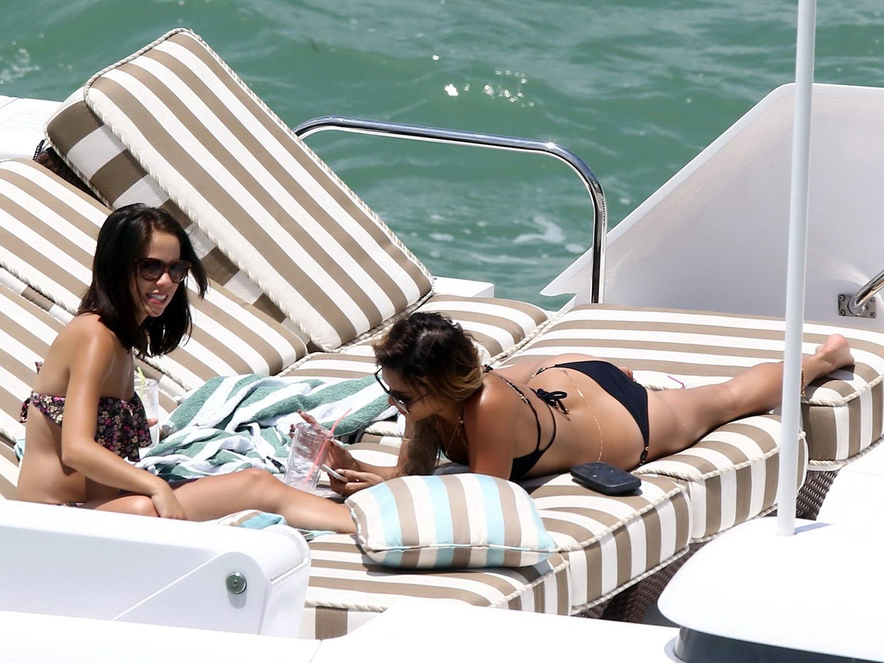 16P Vanessa Hudgens wearing sexy black bikini on a yacht in Miami