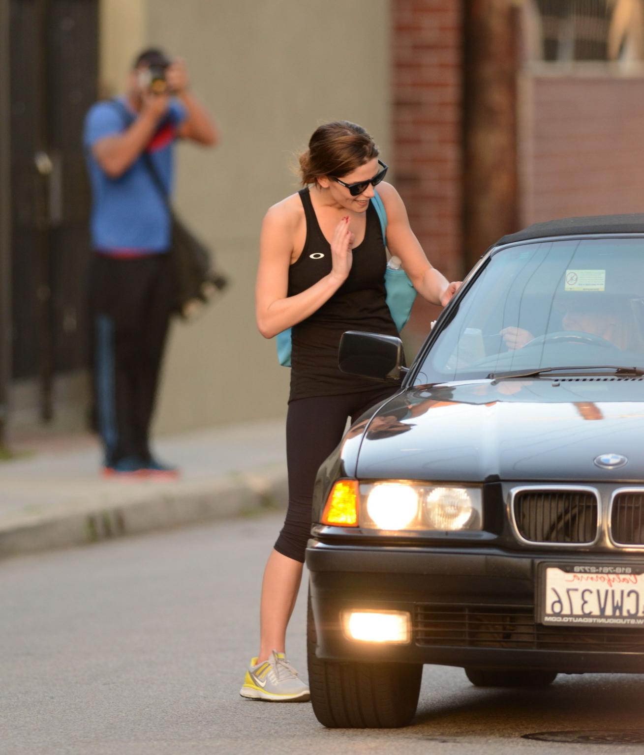 16P Ashley Greene wearing tank top and tights after a gym session in Studio City