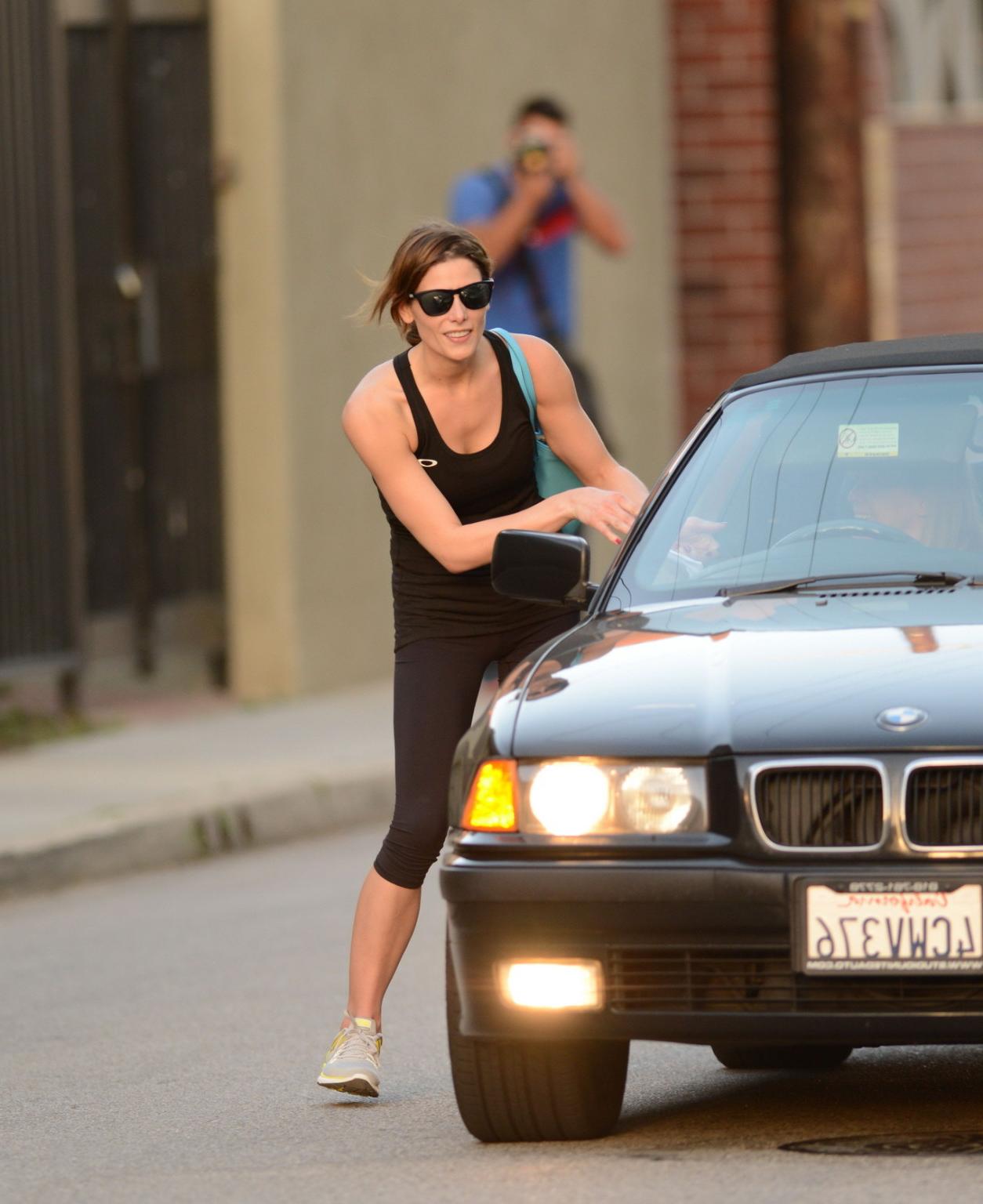 16P Ashley Greene wearing tank top and tights after a gym session in Studio City