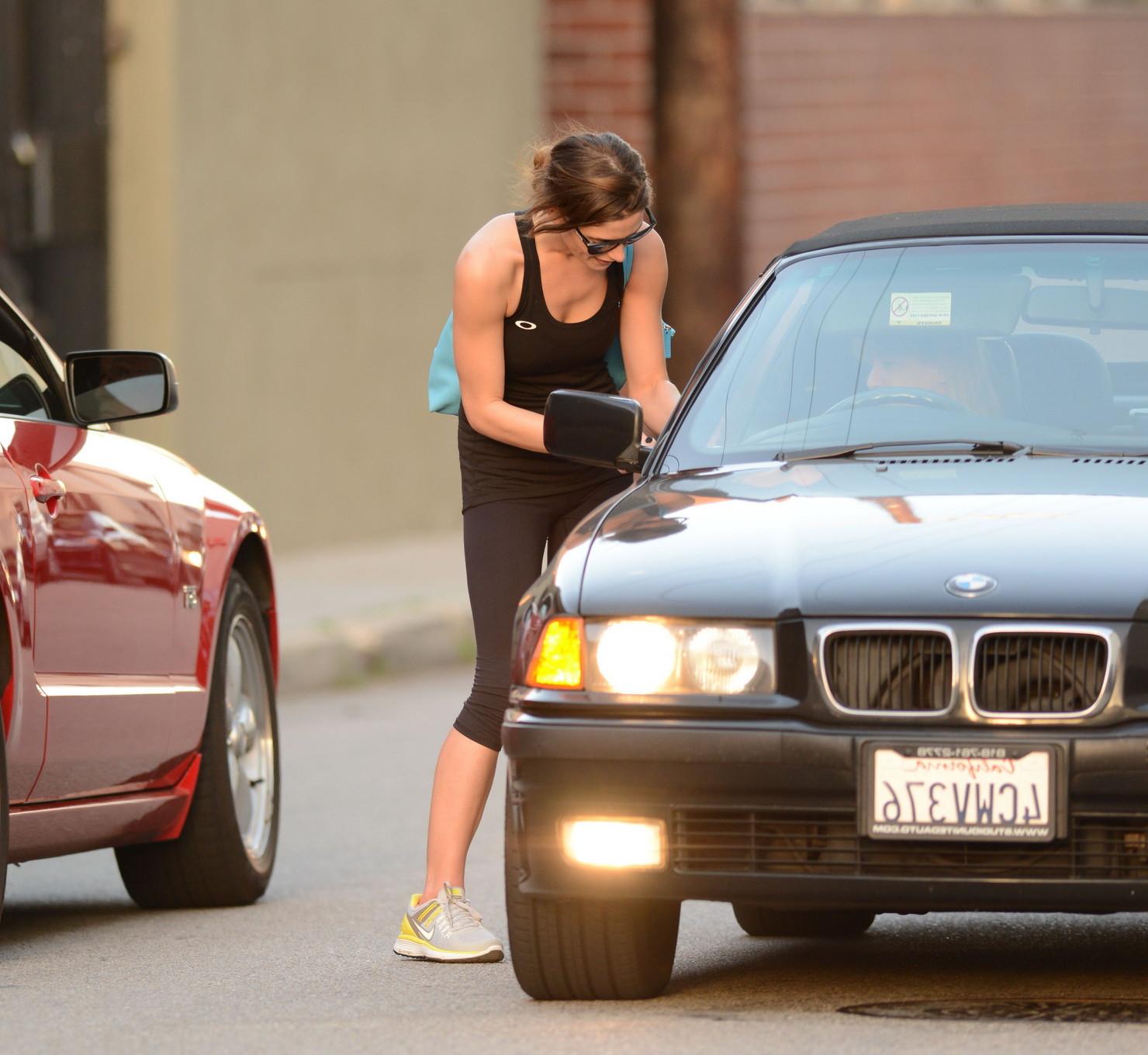 16P Ashley Greene wearing tank top and tights after a gym session in Studio City