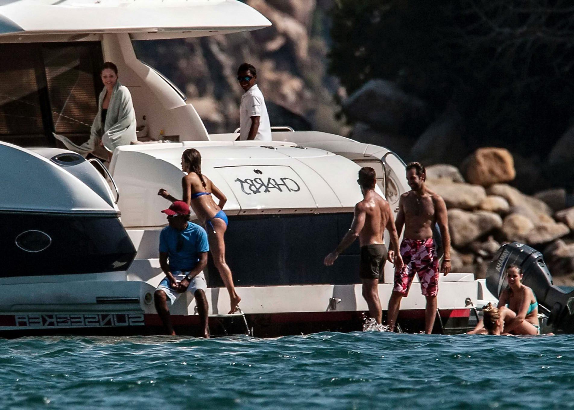 16P Eva Longoria wearing a sexy blue bikini on a yacht in Mexico