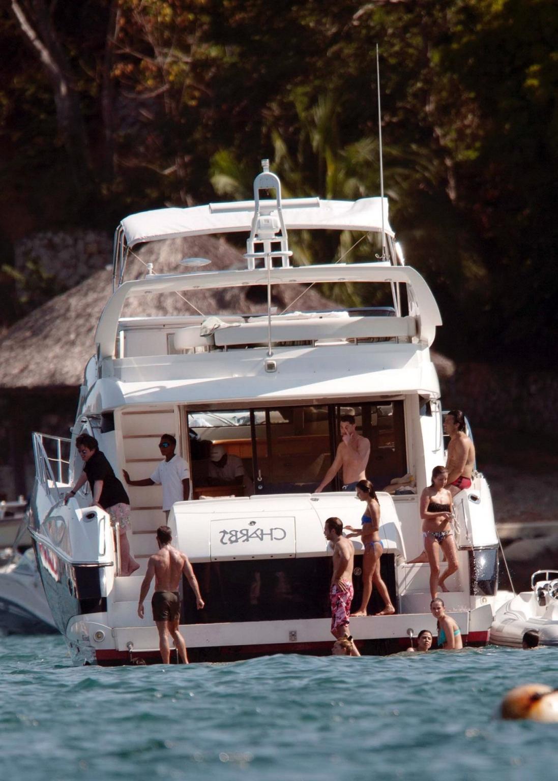 16P Eva Longoria wearing a sexy blue bikini on a yacht in Mexico