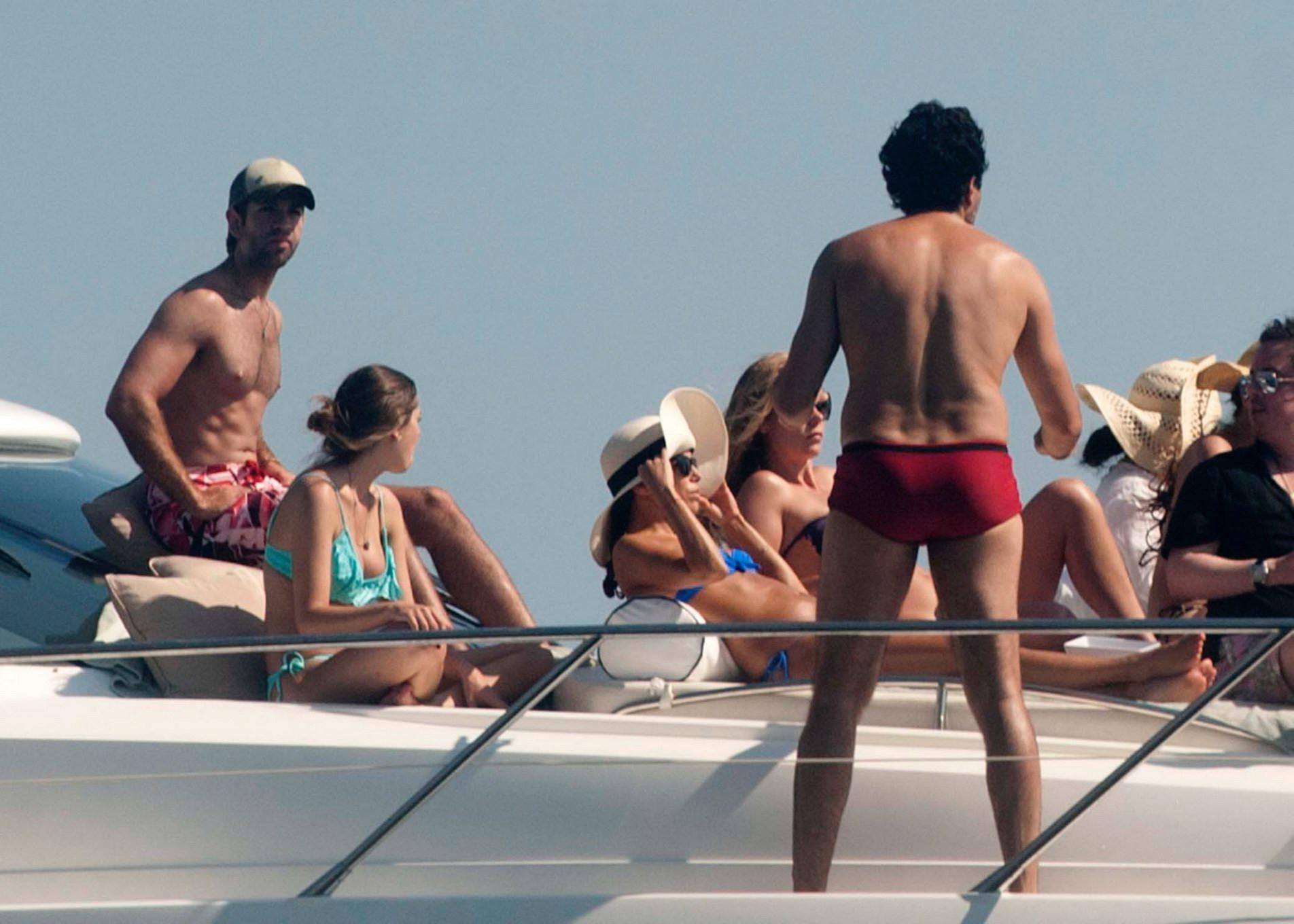 16P Eva Longoria wearing a sexy blue bikini on a yacht in Mexico