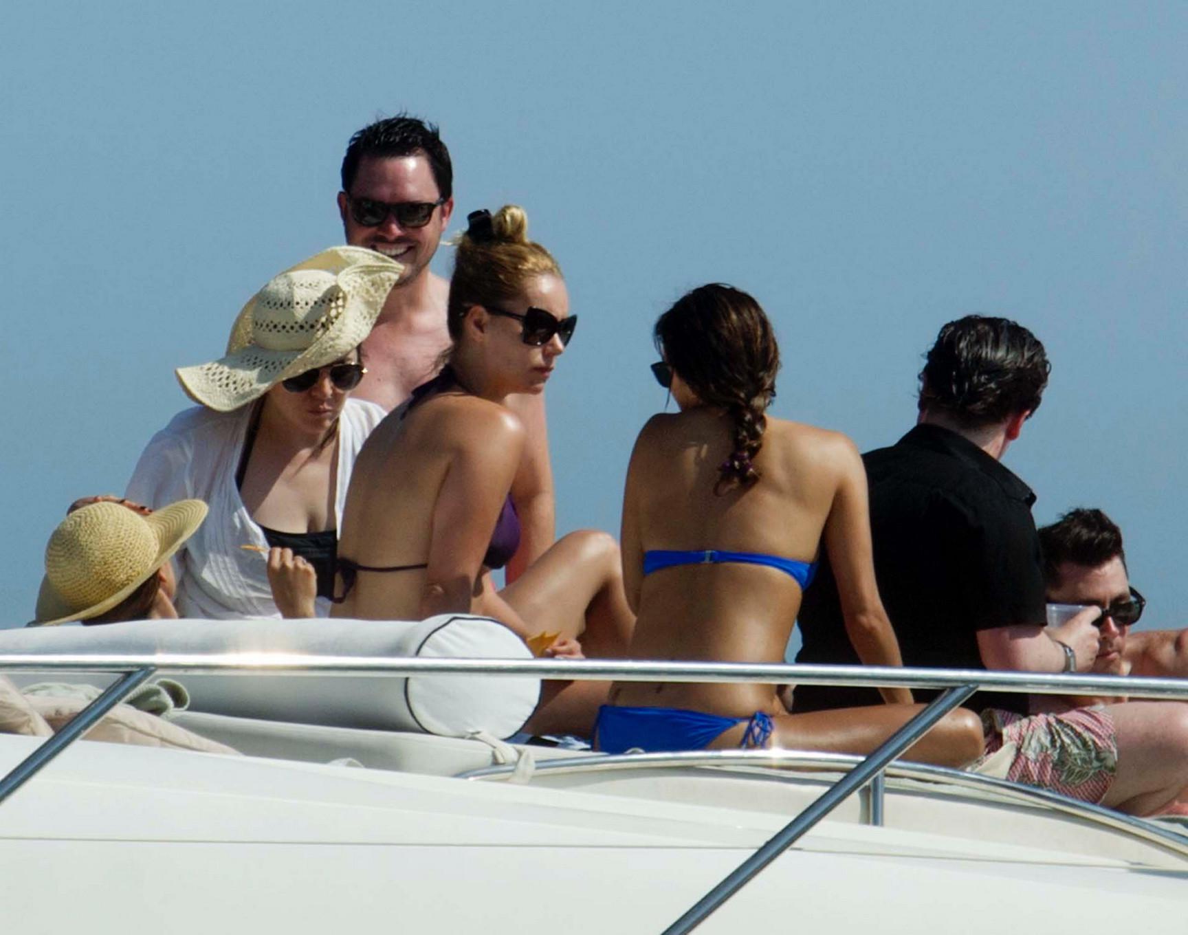 16P Eva Longoria wearing a sexy blue bikini on a yacht in Mexico