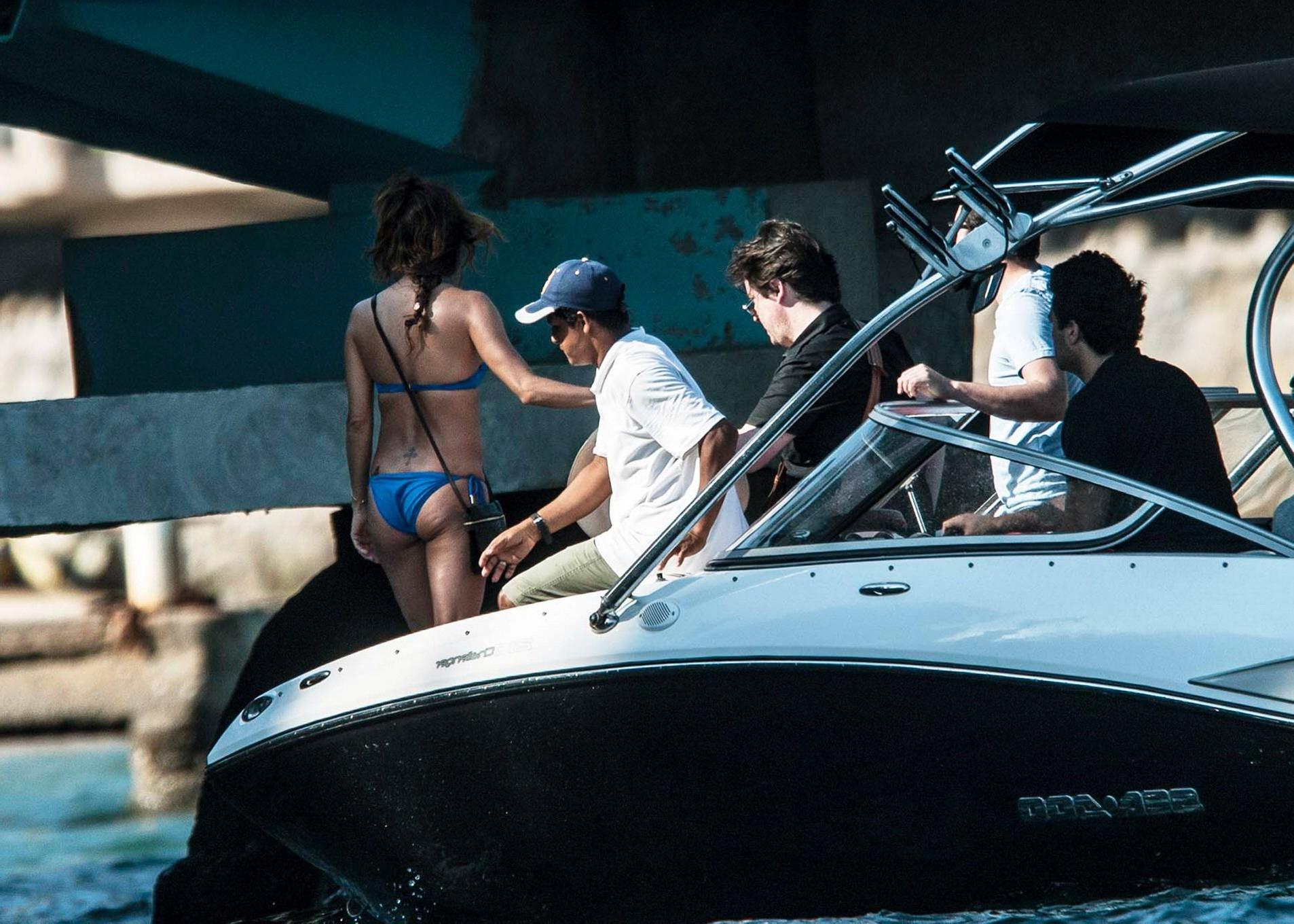 16P Eva Longoria wearing a sexy blue bikini on a yacht in Mexico