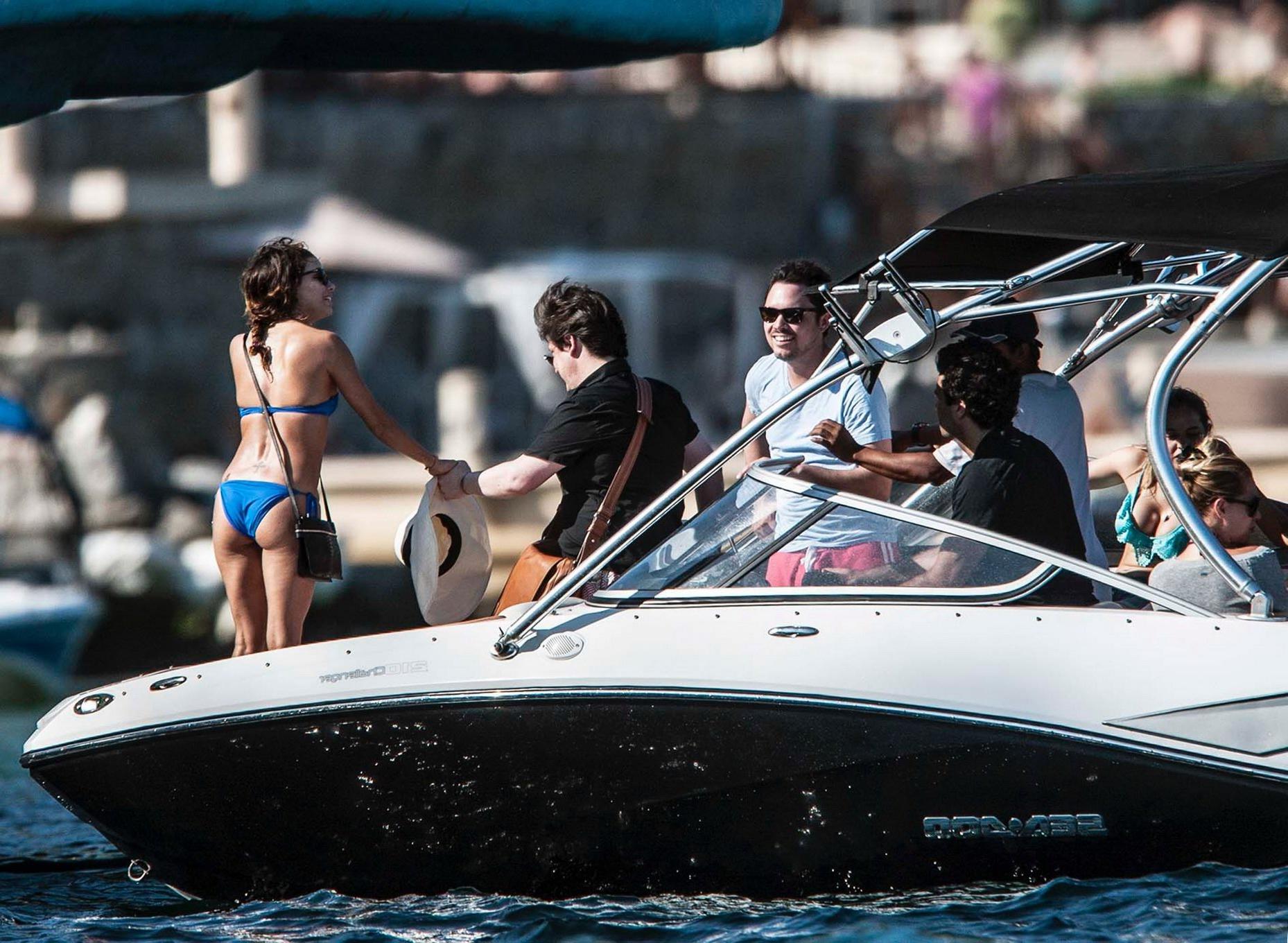 16P Eva Longoria wearing a sexy blue bikini on a yacht in Mexico