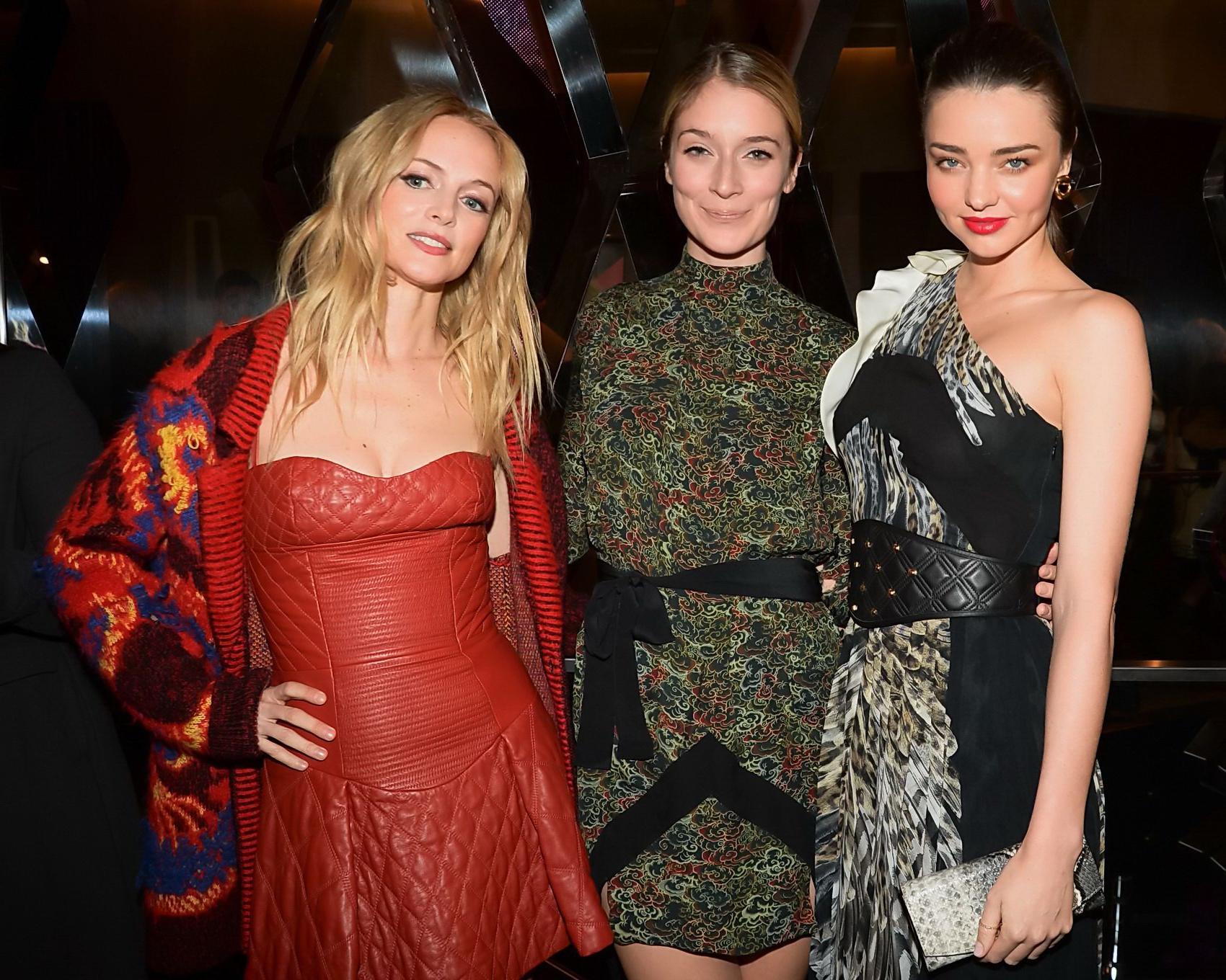 9P Heather Graham cleavy wearing red leather mini dress at Just Cavalli Soho Flagsh