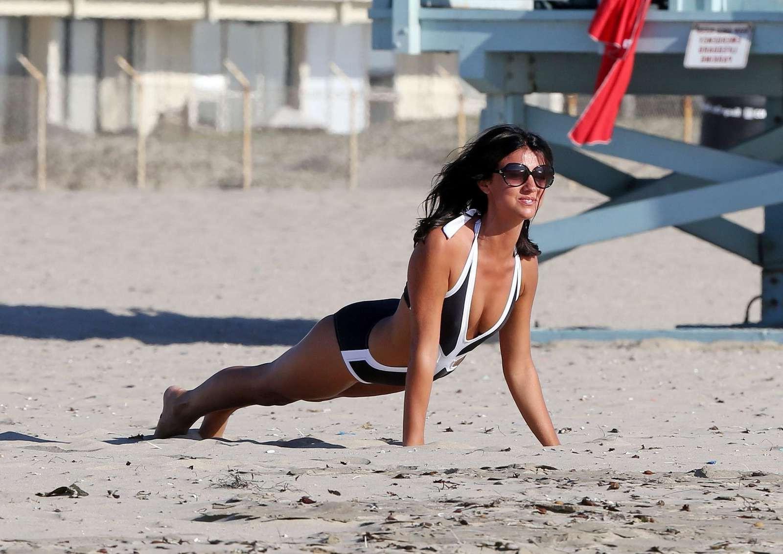 16P Lucy Mecklenburgh in sexy monokini working out on Santa Monica Beach