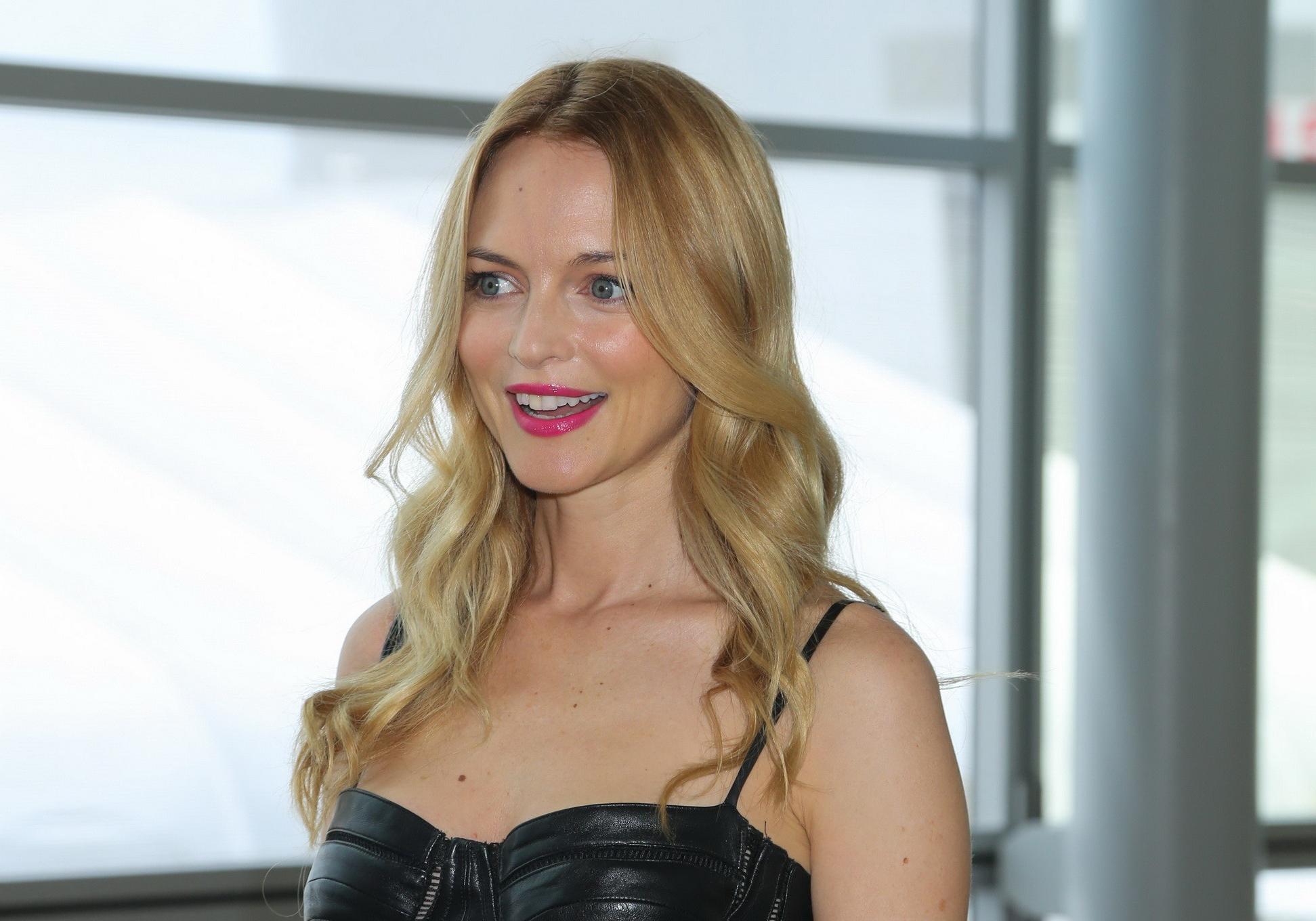 16P Heather Graham wearing skimpy black leather mini dress at the Echoes Of Hope's 3