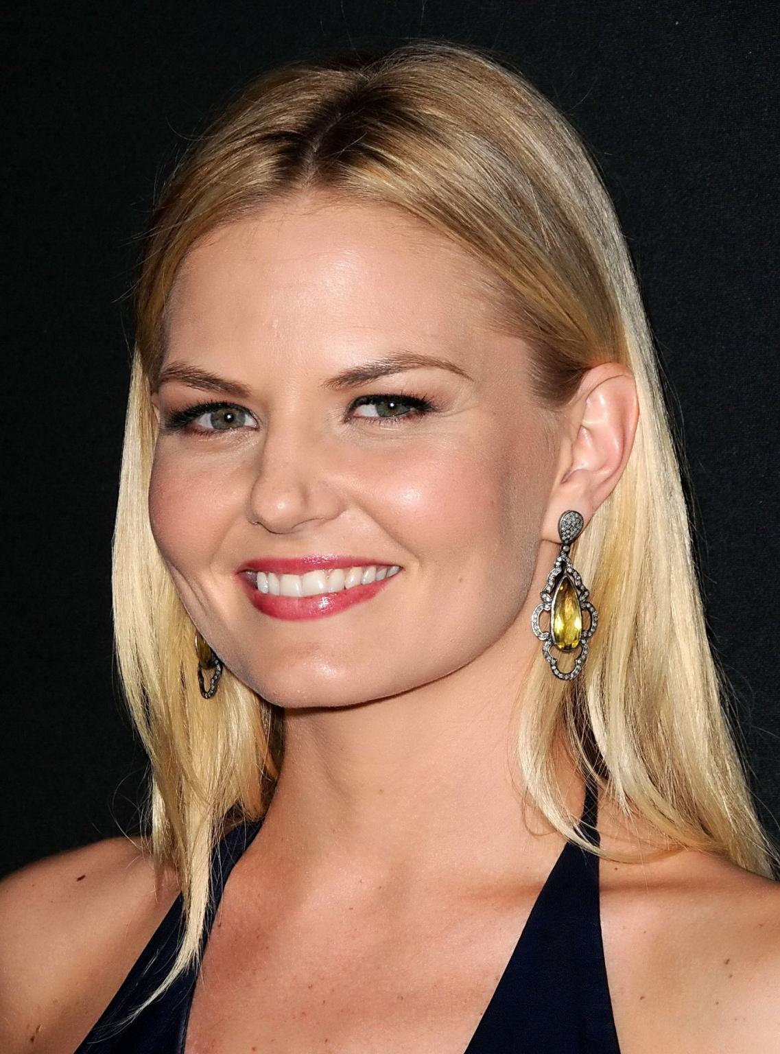 16P Jennifer Morrison braless wearing black leather mini dress at the Myspace Launch