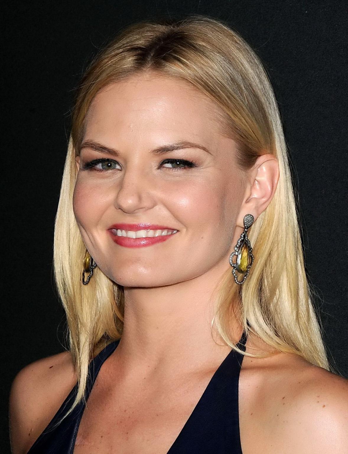 16P Jennifer Morrison braless wearing black leather mini dress at the Myspace Launch