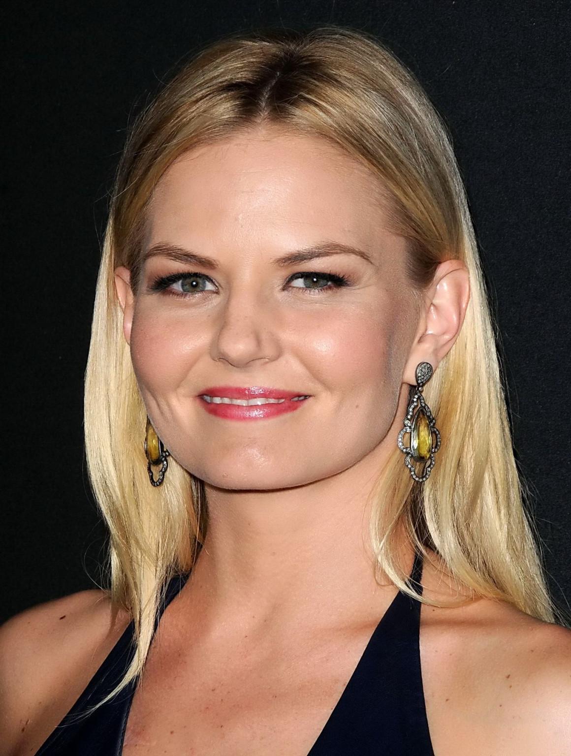 16P Jennifer Morrison braless wearing black leather mini dress at the Myspace Launch