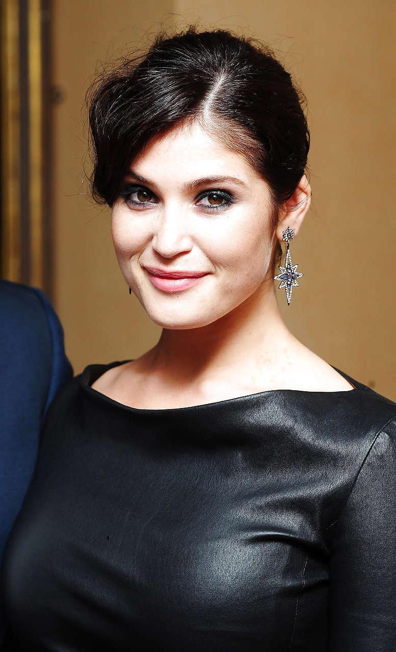 16P Gemma Arterton in leather dress showing big boobs and big ass