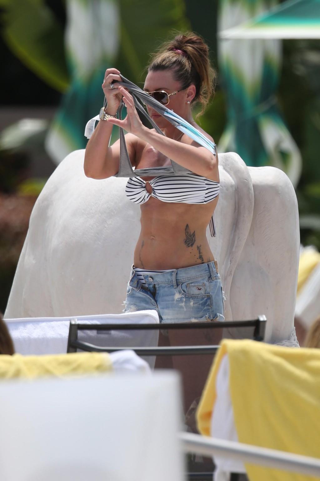 13P Michelle Heaton stripping to bikini on the set of a fitness show on Miami Beach