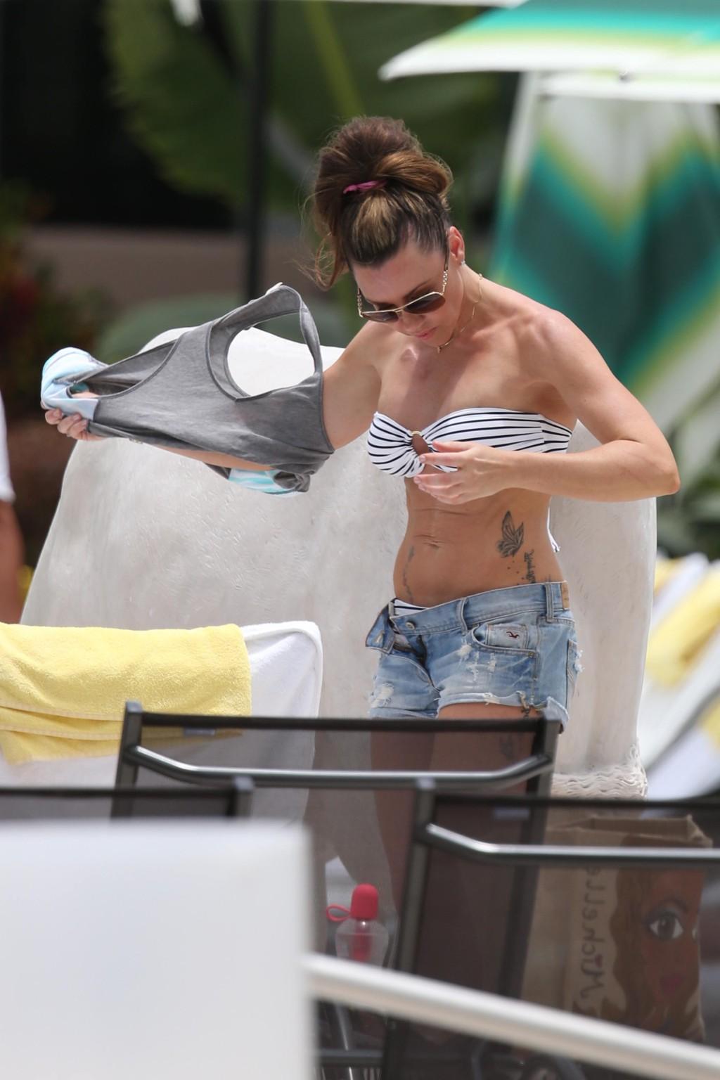 13P Michelle Heaton stripping to bikini on the set of a fitness show on Miami Beach