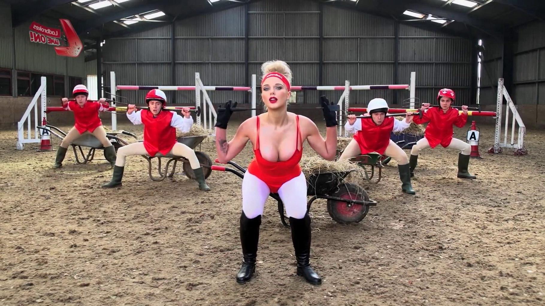 16P Helen Flanagan bursting out of red hot bodysuit at the Cheltenham workout for La