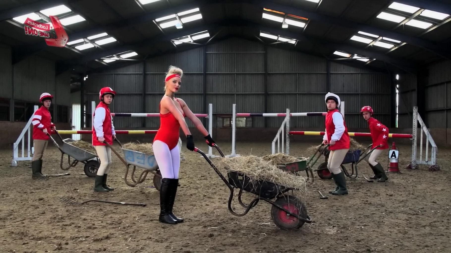 16P Helen Flanagan bursting out of red hot bodysuit at the Cheltenham workout for La