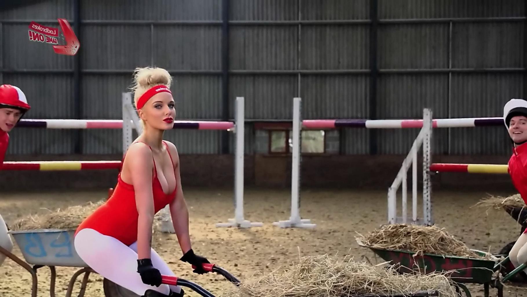 16P Helen Flanagan bursting out of red hot bodysuit at the Cheltenham workout for La