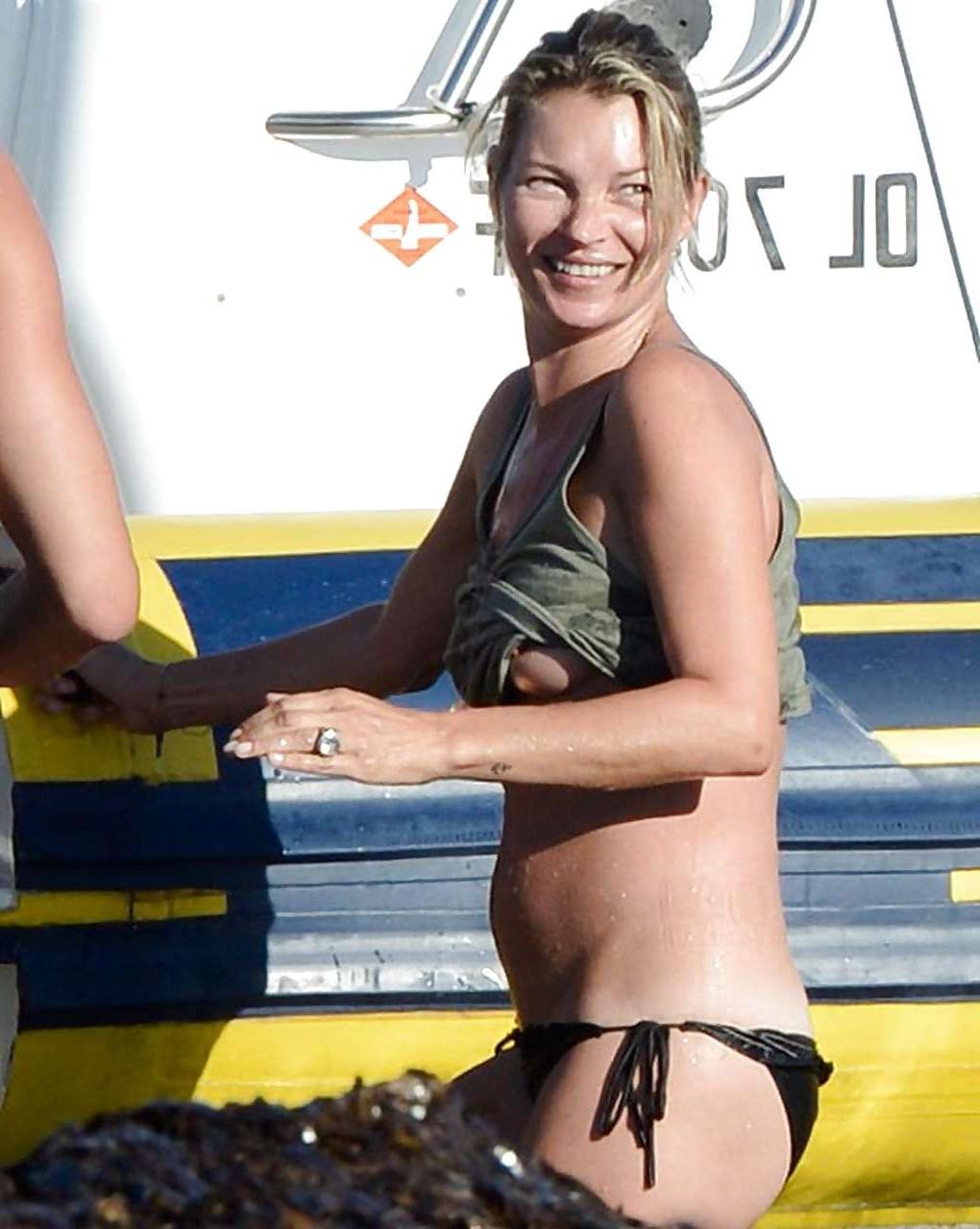10P Kate Moss showing tits on vacation and flash panties upskirt