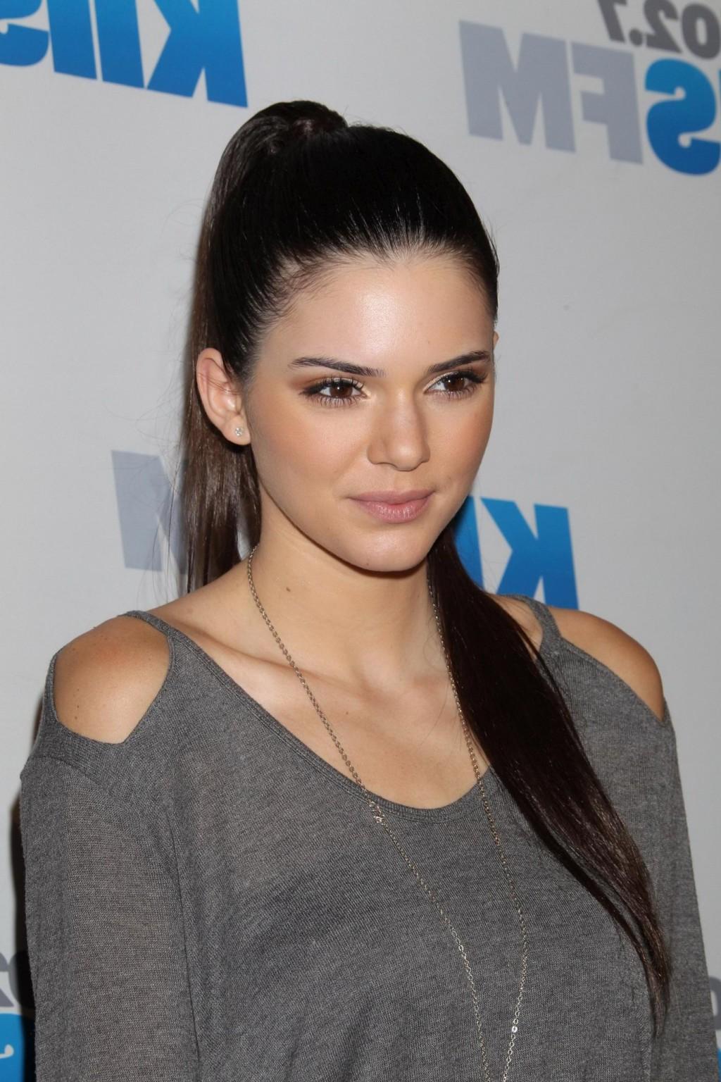 10P Kendall Jenner leggy wearing a leather mini skirt at KIIS FMs Jingle Ball 2012 i
