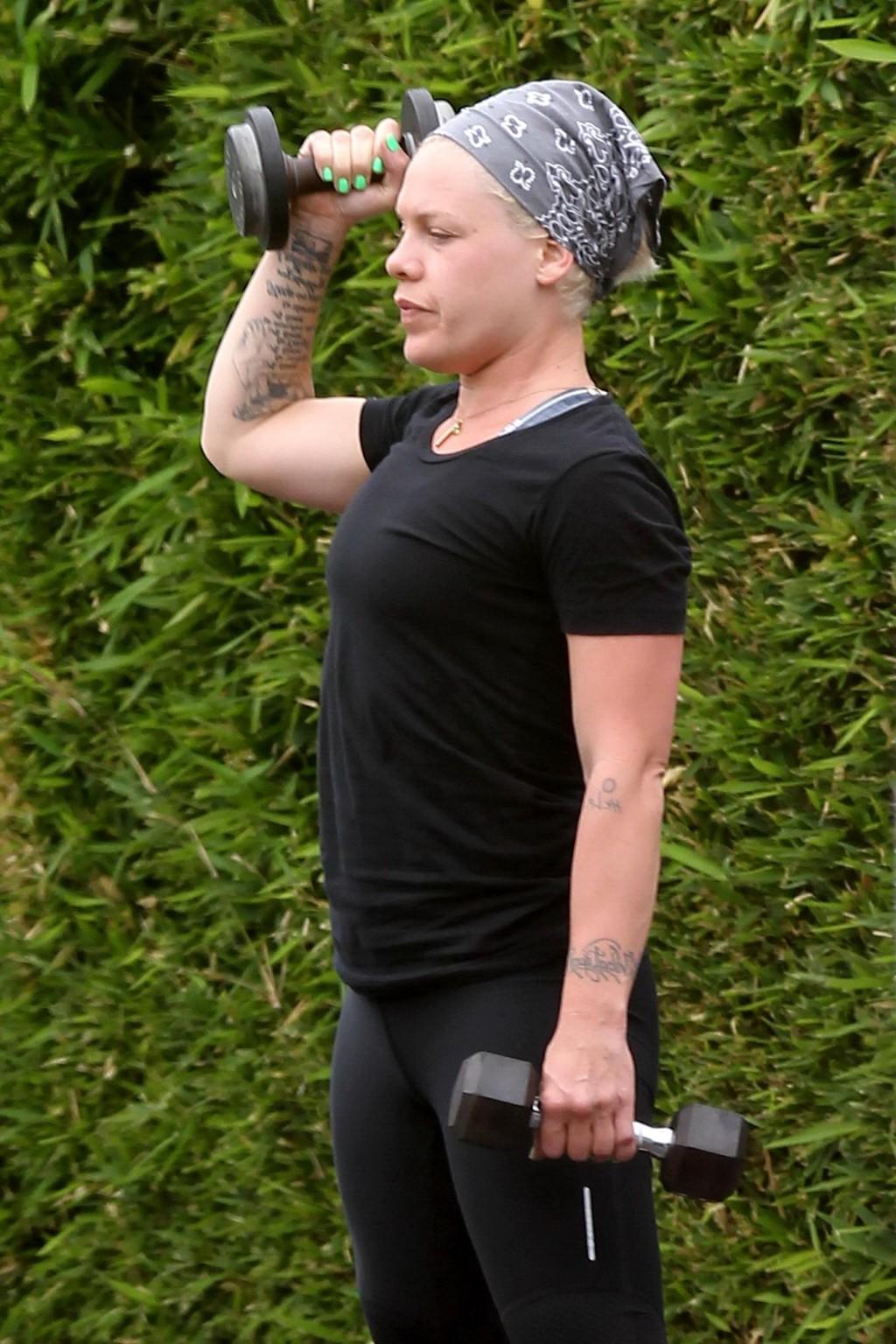 10P Pink shows off her ass in tights while working out in Malibu