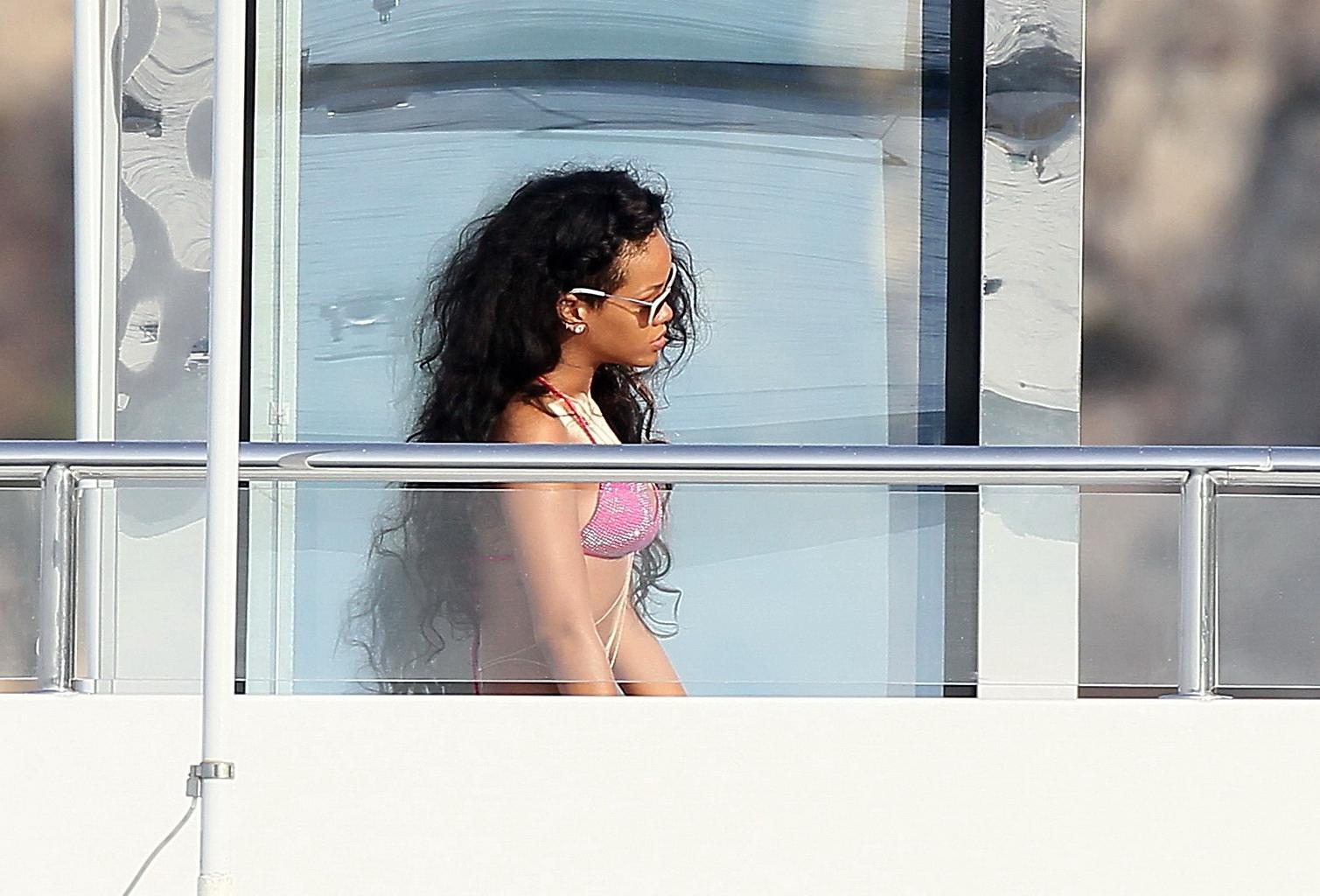 9P Rihanna shows off her ass wearing pink bikini on a yacht in France