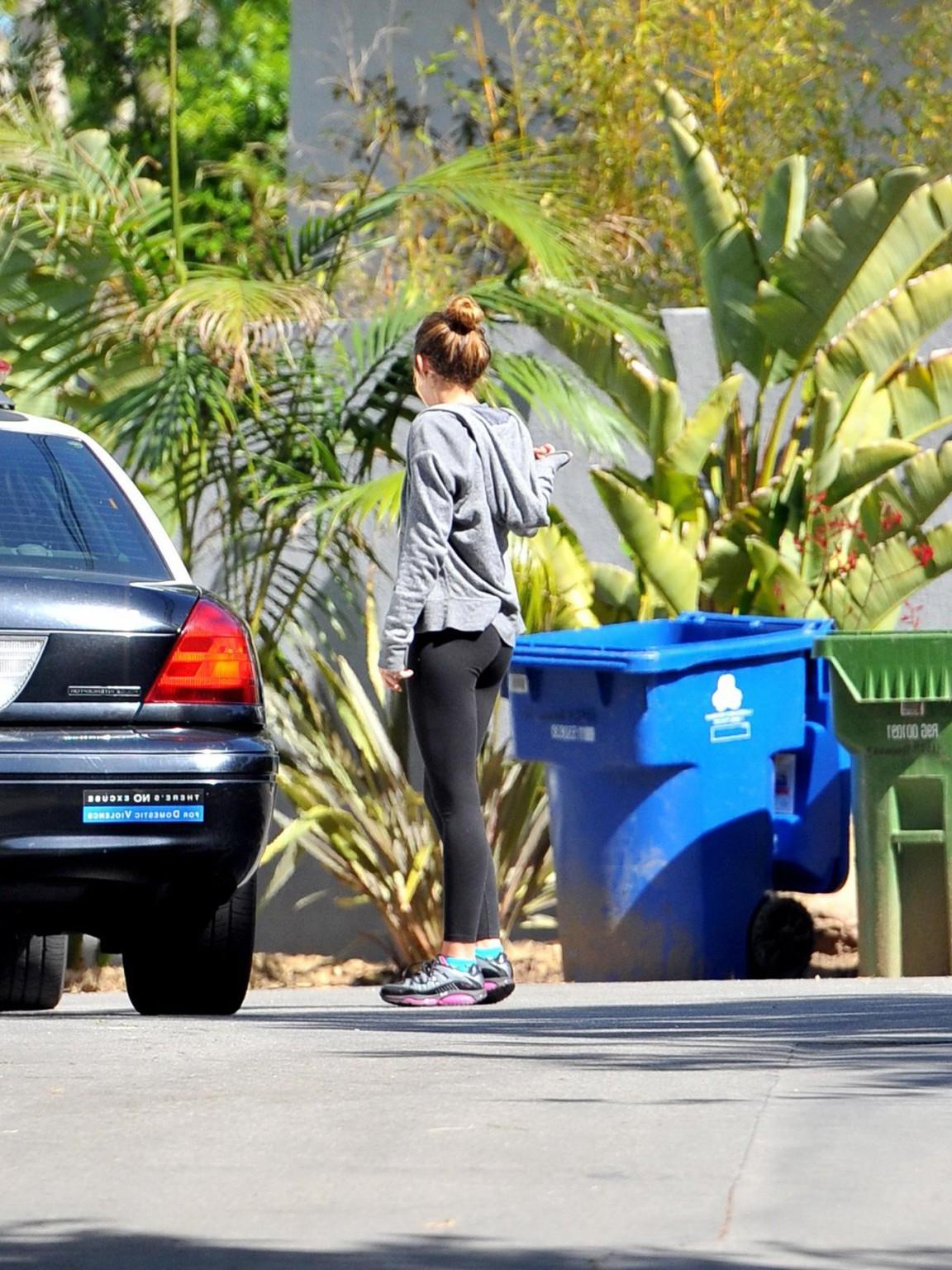 16P Miley Cyrus showing off her ass in tights after a workout in Hollywood