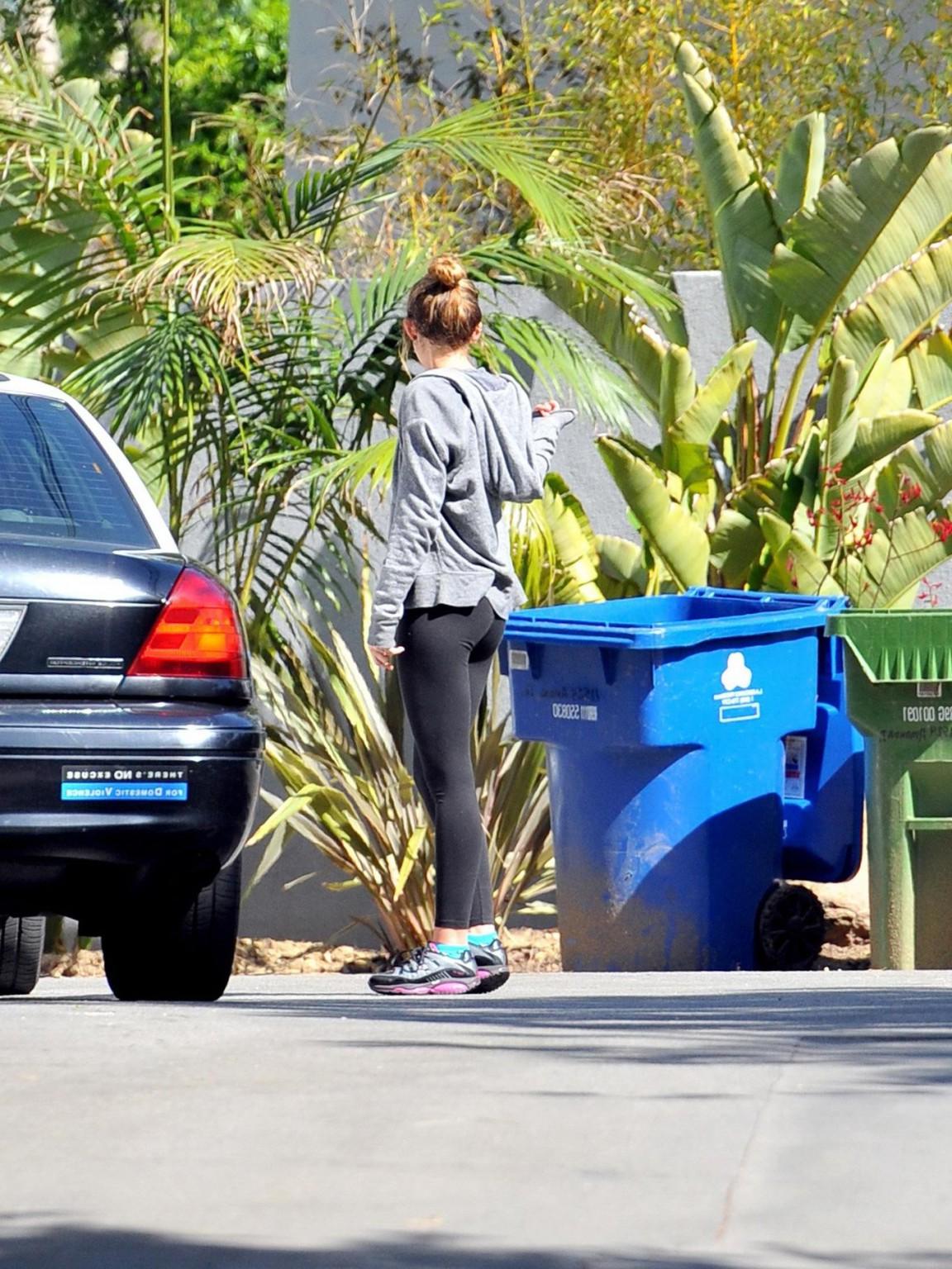 16P Miley Cyrus showing off her ass in tights after a workout in Hollywood