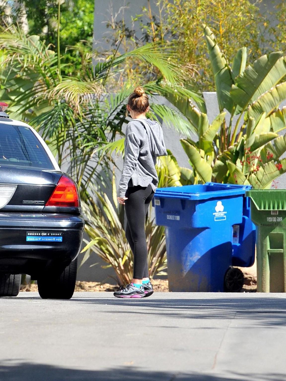 16P Miley Cyrus showing off her ass in tights after a workout in Hollywood