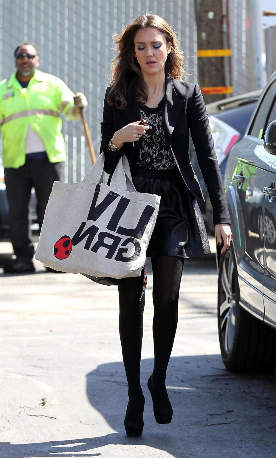 16P Jessica Alba leggy wearing a black leather mini skirt  pantyhose