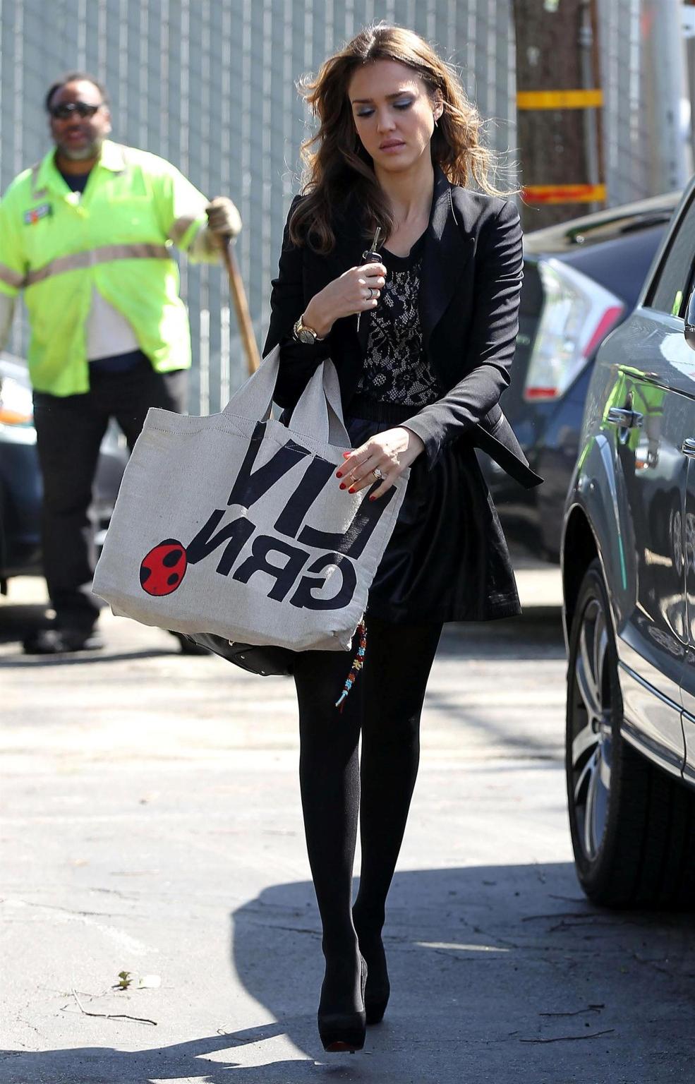 16P Jessica Alba leggy wearing a black leather mini skirt  pantyhose