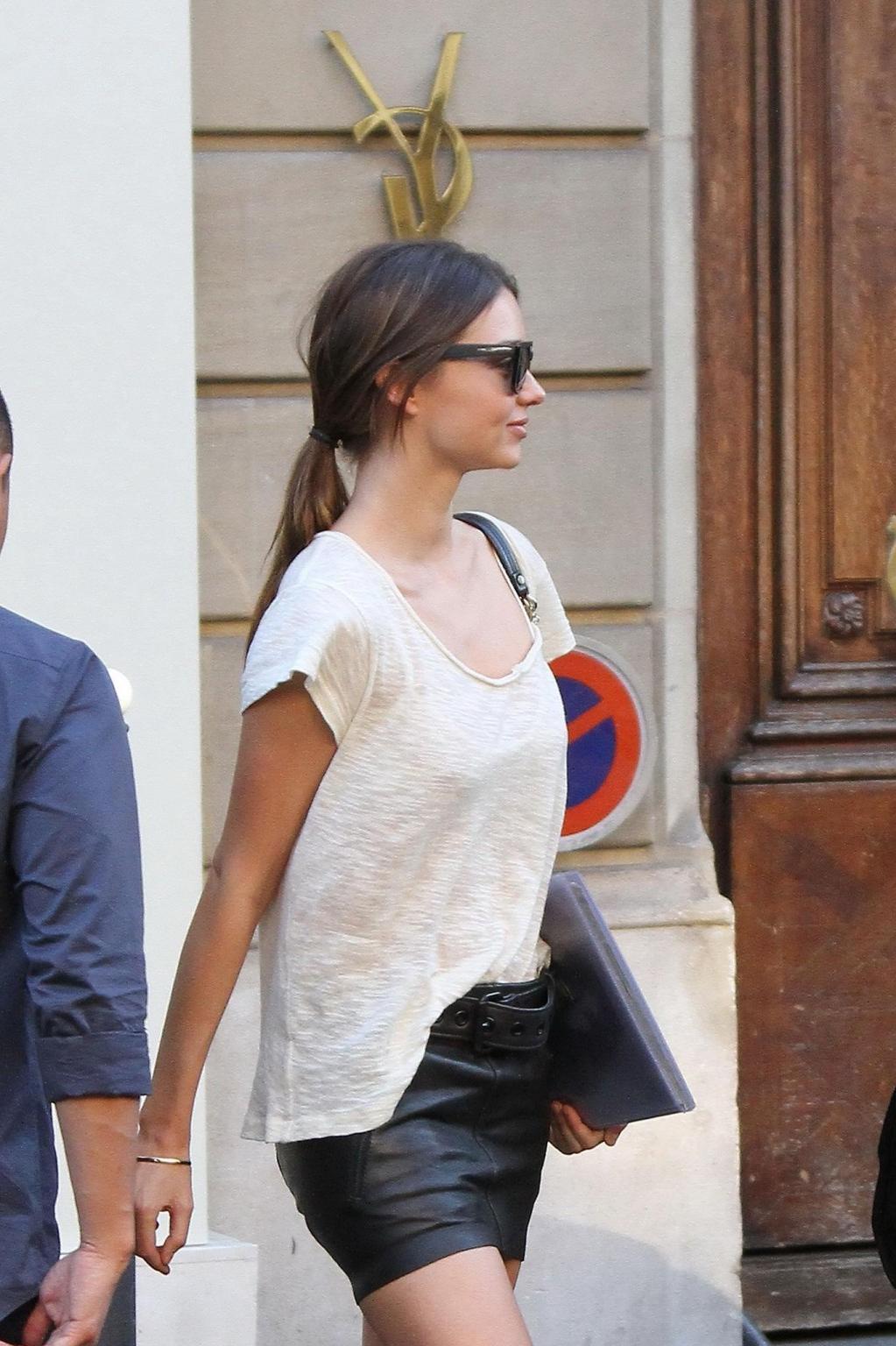 16P Miranda Kerr leggy in leather mini skirt outside the Dior offices in Paris