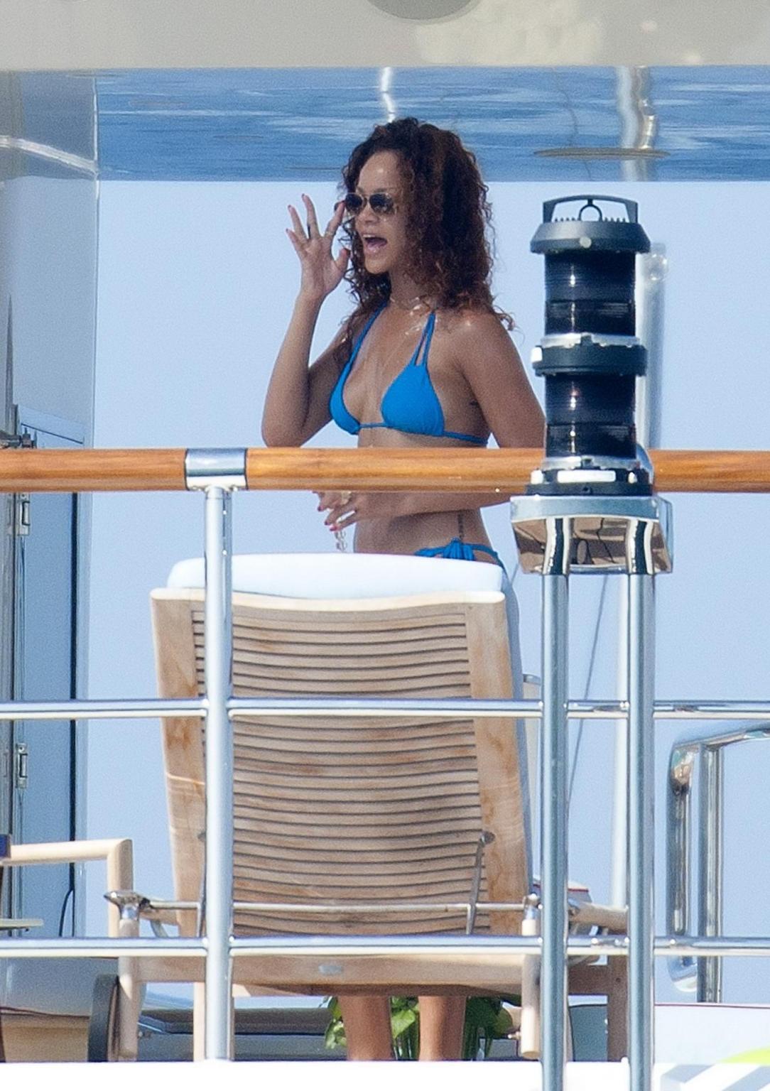 16P Rihanna wearing sky blue bikini on a yacht in Saint-Tropez