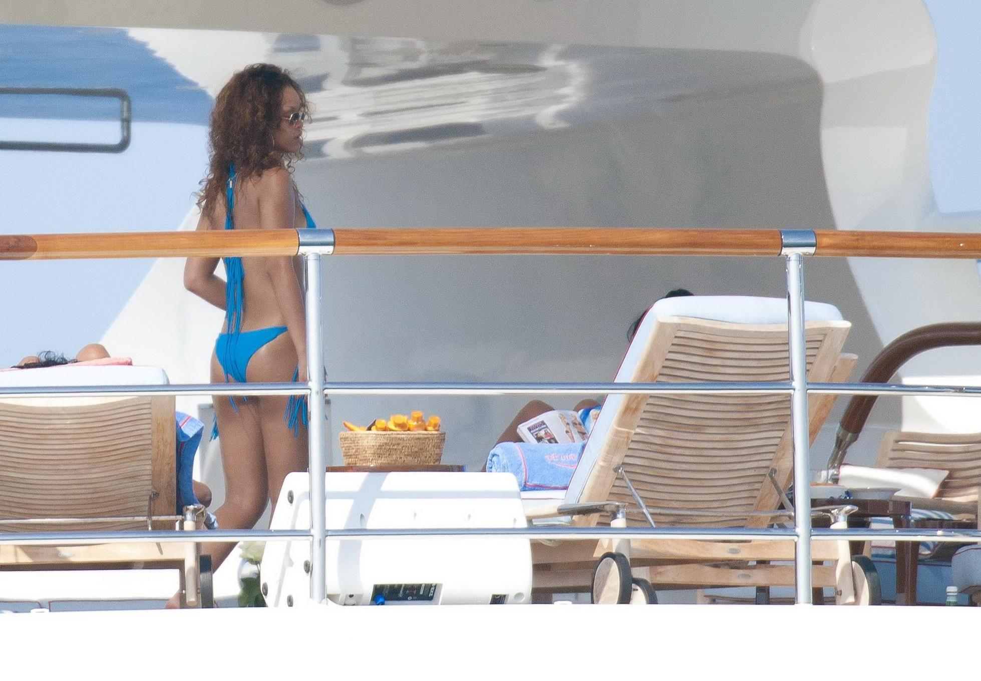 16P Rihanna wearing sky blue bikini on a yacht in Saint-Tropez