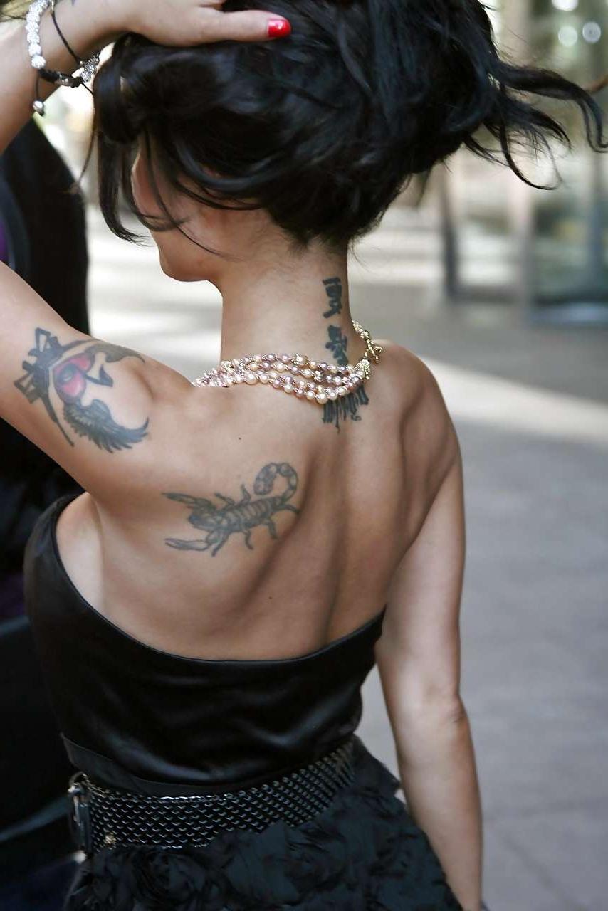 16P Tila Tequila showing her nice tits in see thru top and almost flash ass in black