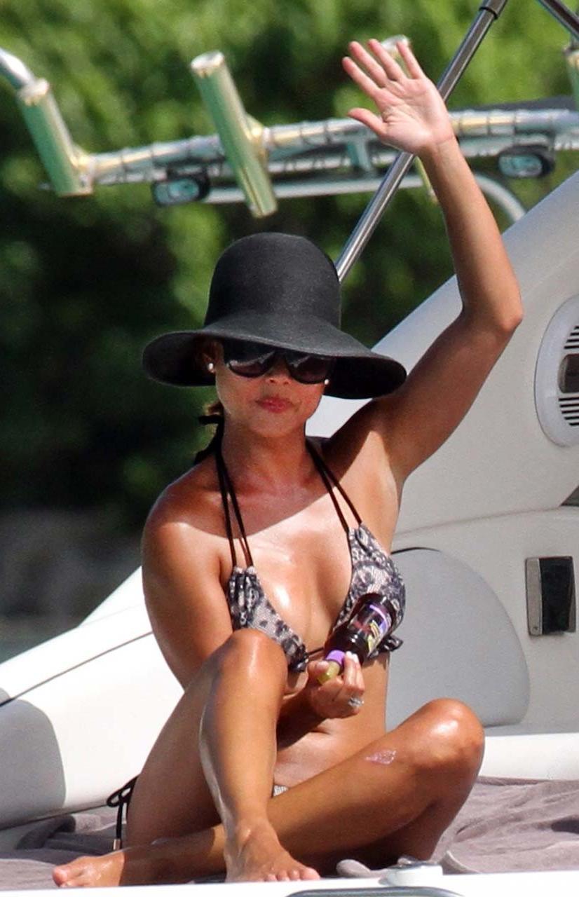16P Vanessa Minnillo exposing sexy body and hot ass in bikini on yacht