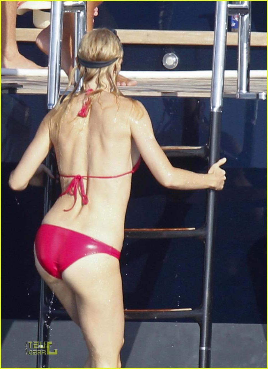 16P Gwyneth Paltrow exposing sexy body and hot ass in bikini on yacht