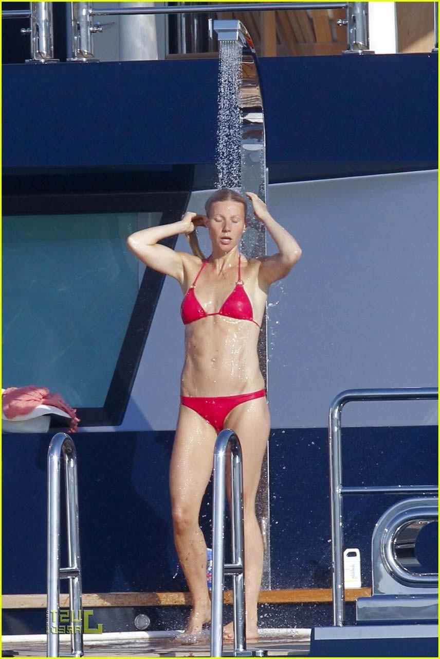 16P Gwyneth Paltrow exposing sexy body and hot ass in bikini on yacht