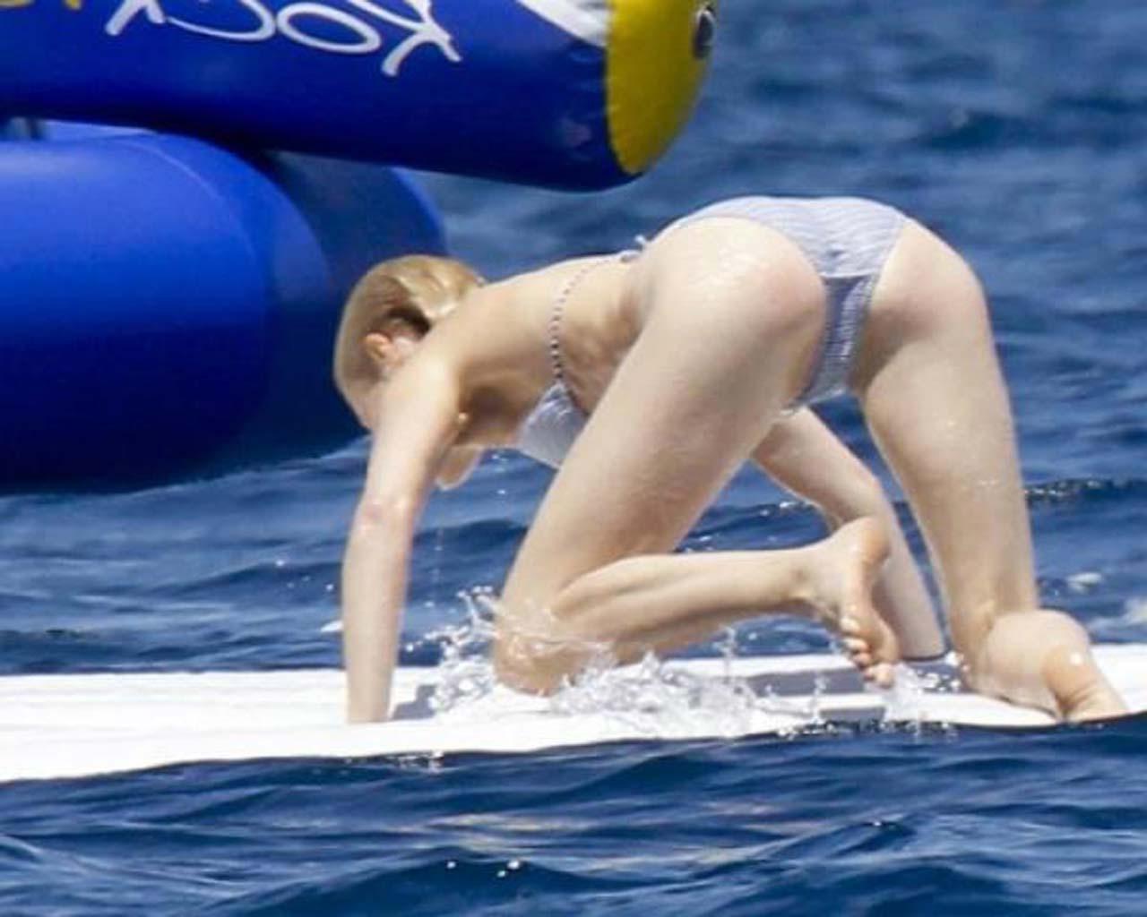 16P Gwyneth Paltrow exposing sexy body and hot ass in bikini on yacht
