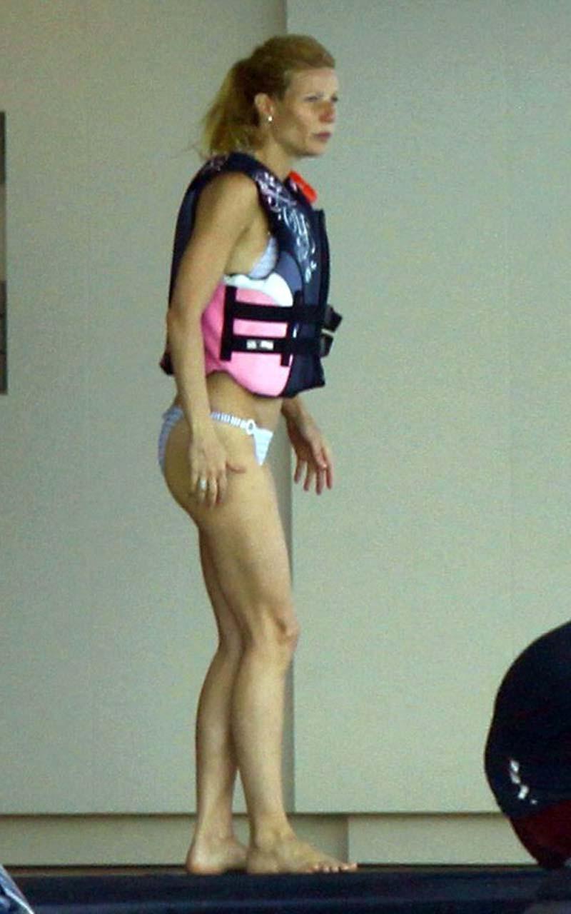 16P Gwyneth Paltrow exposing sexy body and hot ass in bikini on yacht