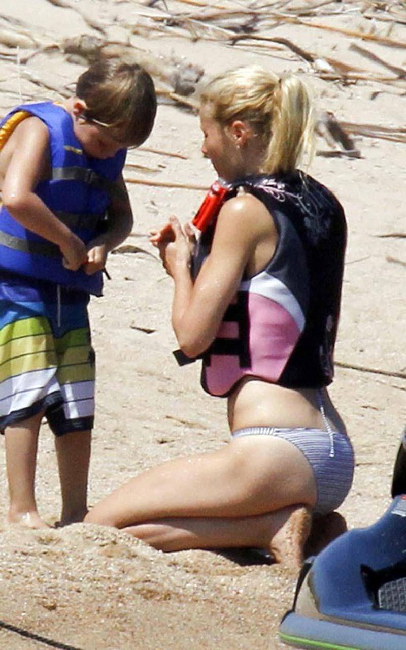 16P Gwyneth Paltrow exposing sexy body and hot ass in bikini on yacht