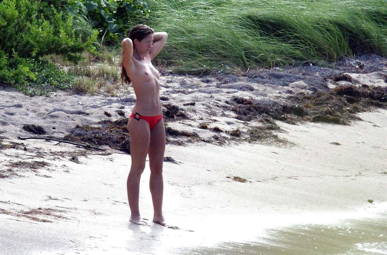 16P Rebecca Gayheart showing her nice tits on beach and yacht