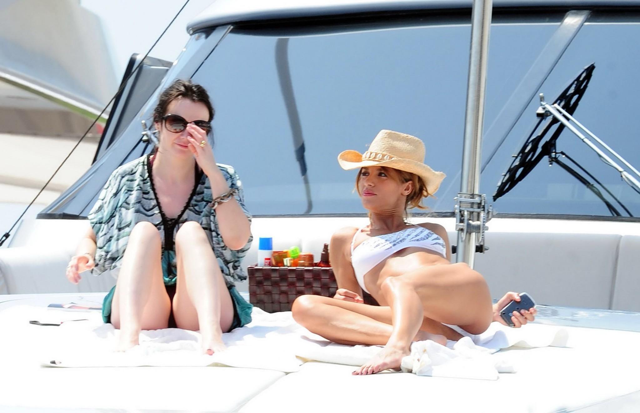 16P Elisabetta Canalis shows off her perfect ass wearing white bikini on a yacht in 