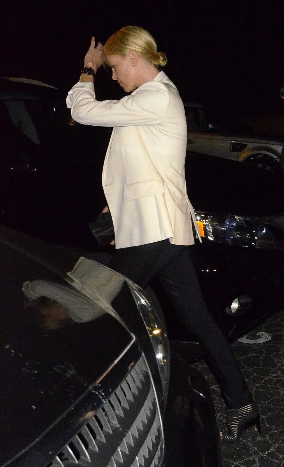 16P Charlize Theron wearing leather pants outside the Sushi restaurant in Beverly Hi