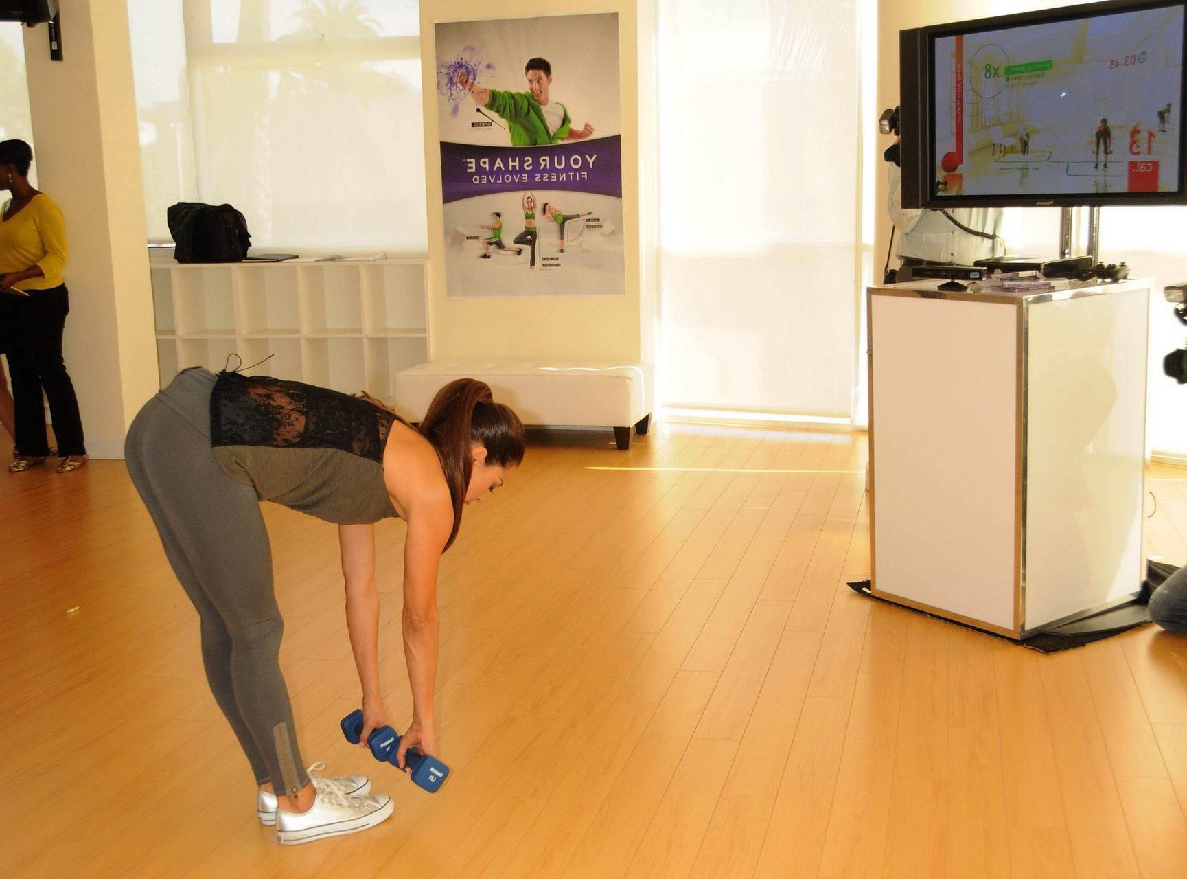 16P Brooke Burke working out in tights  tank-top at Ubisoft's 'Your Shape Fitness Ev