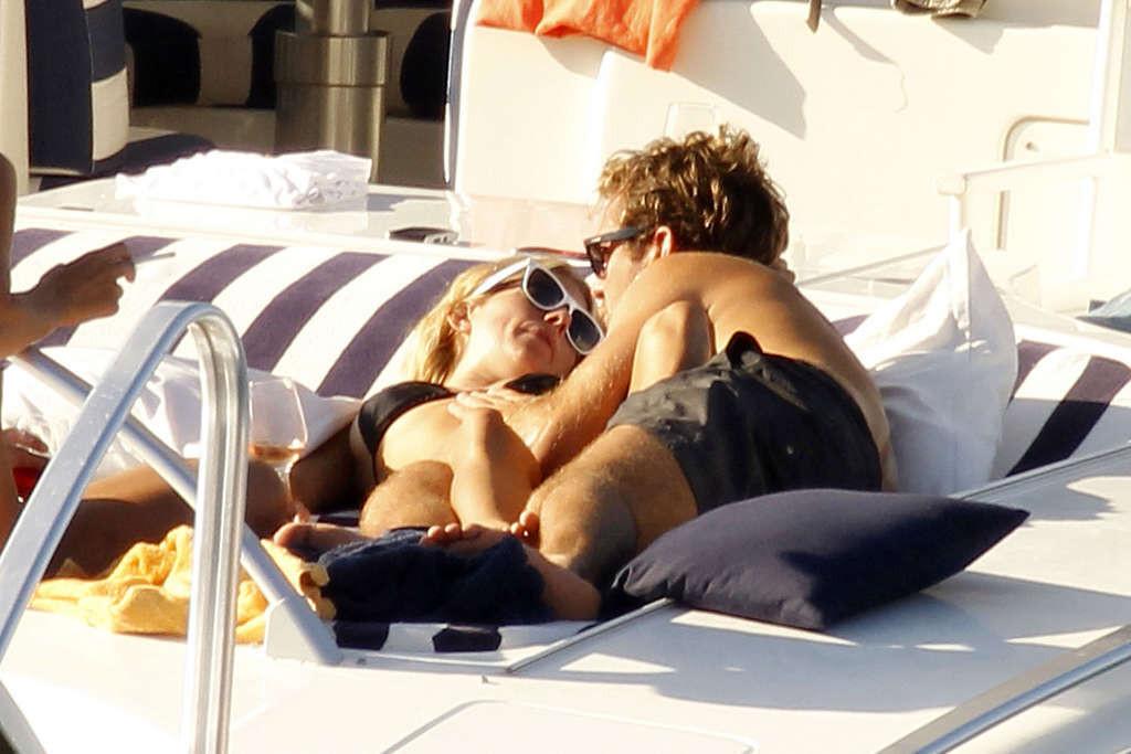 16P Sienna Miller exposing her sexy body and hot ass in black bikini on yacht