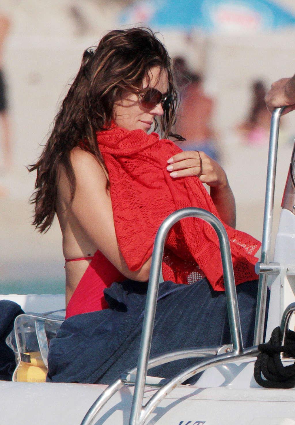 16P Elizabeth Hurley exposing her sexy body and huge boobs in bikini on yacht