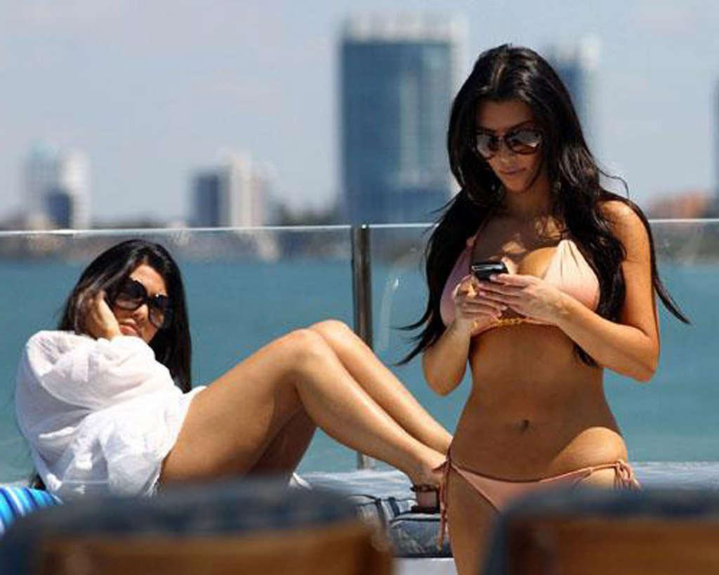 10P Kim Kardashian posing very sexy in bikini on yacht and upskirt and nude