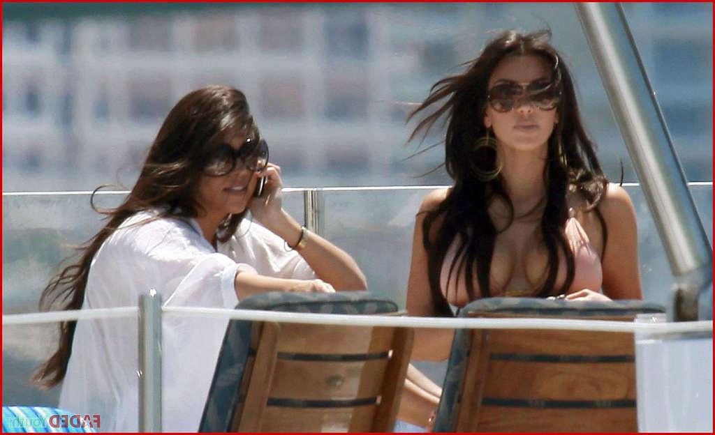 10P Kim Kardashian posing very sexy in bikini on yacht and upskirt and nude
