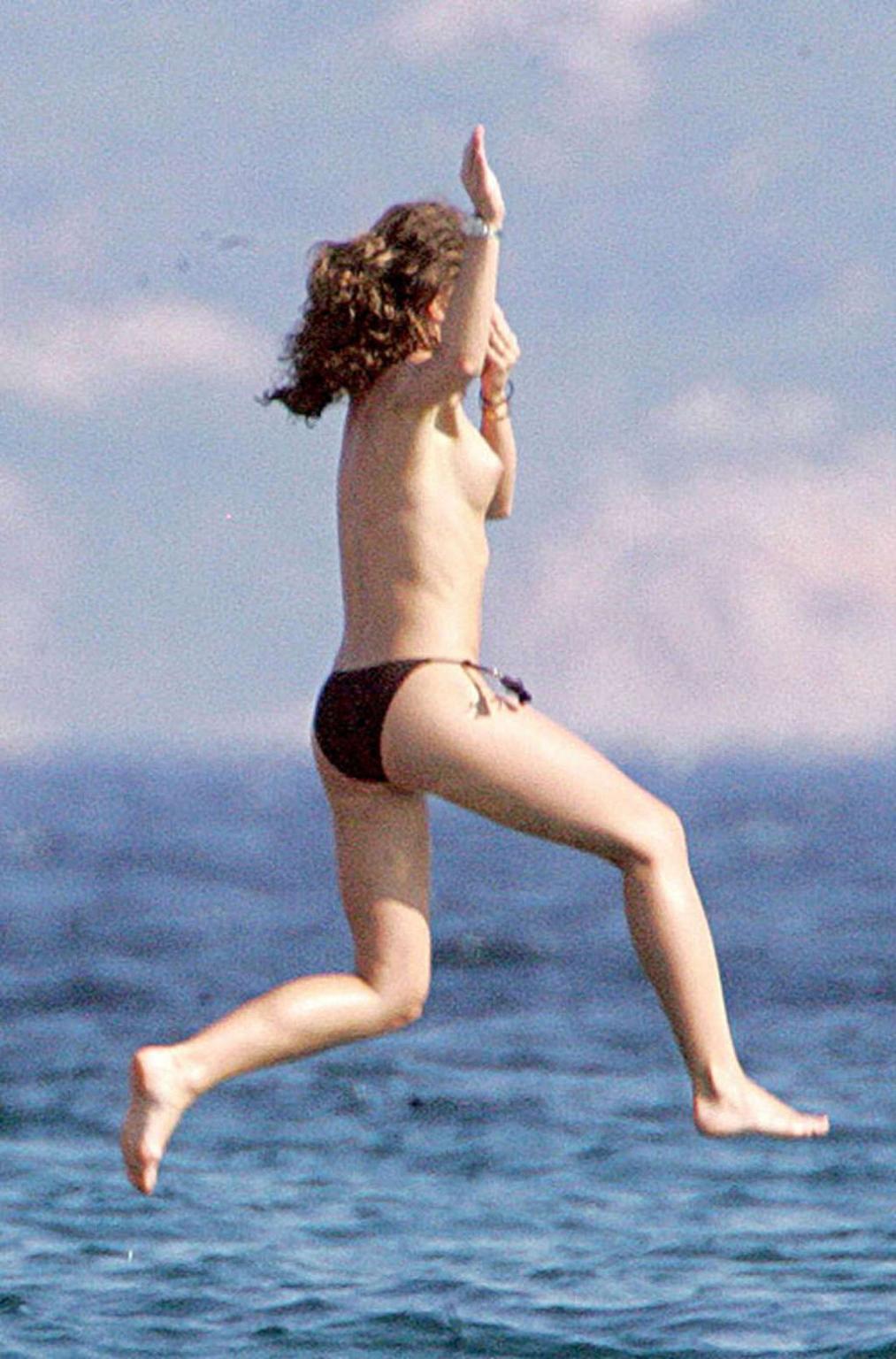 10P Rebecca Gayheart exposing her nice big tits on yacht and beach paparazzi picture